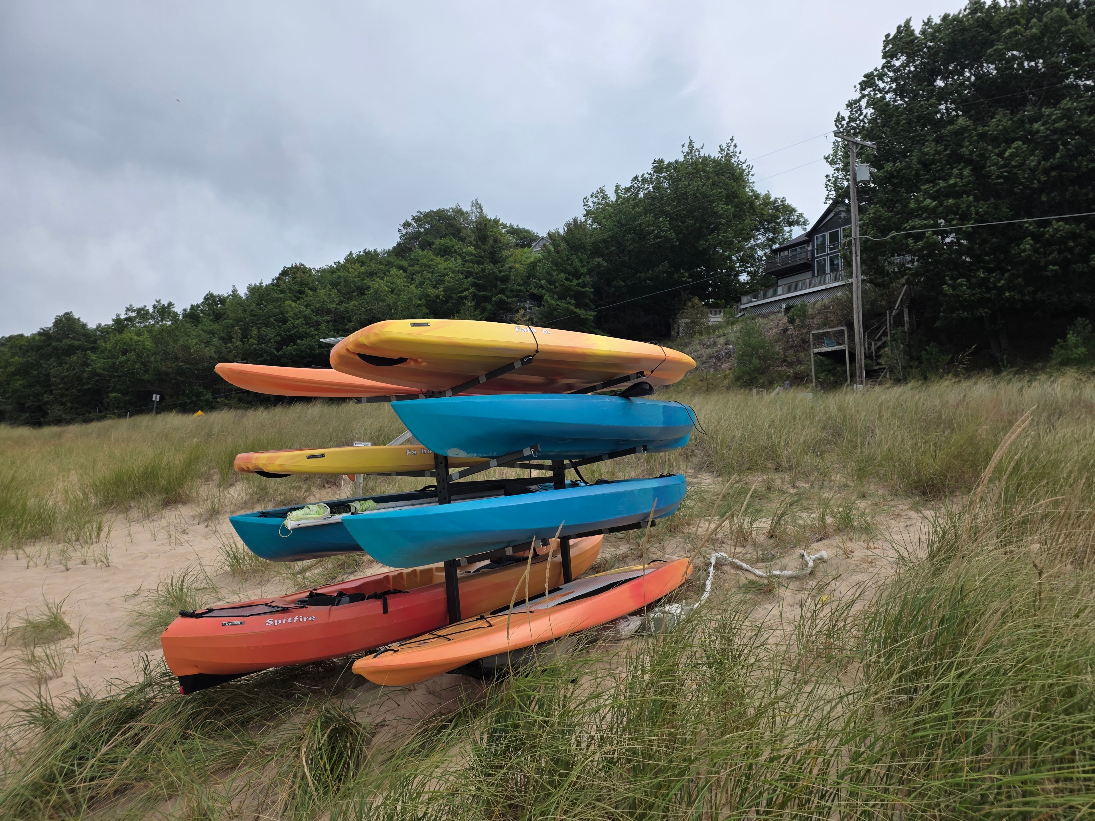 Kayaks and paddleboards on the beach