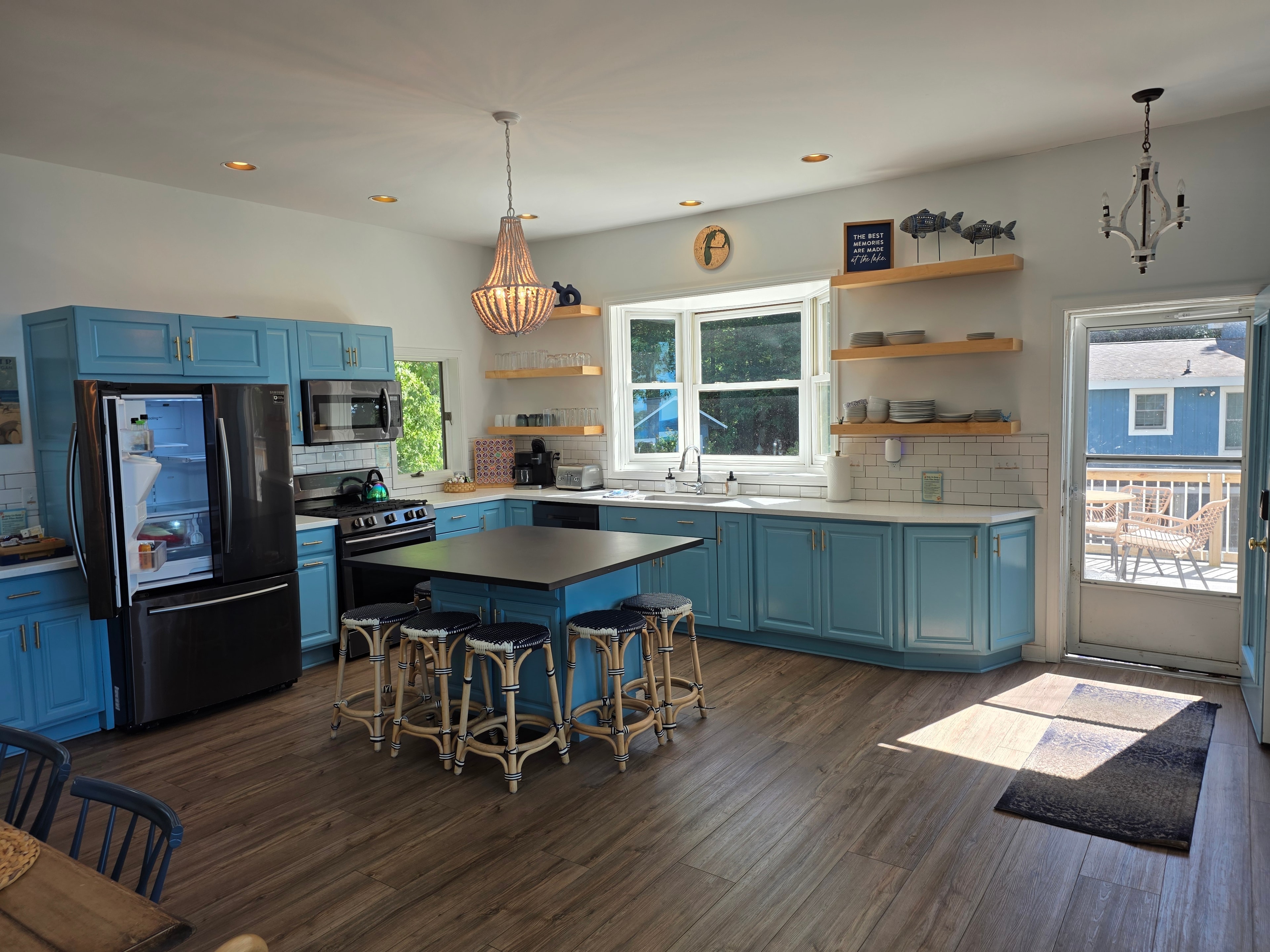 Blue kitchen with island seating